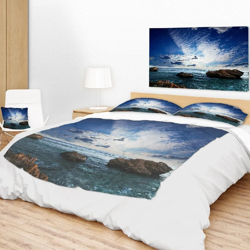 toddler cotton throw blanket-Designart 'Rocky Beach with White Clouds' Modern Beach Throw Blanket